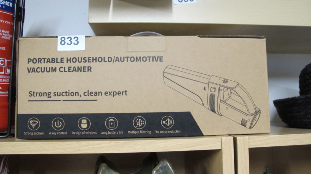 Lot 833: Portable hand held vacuum cleaner