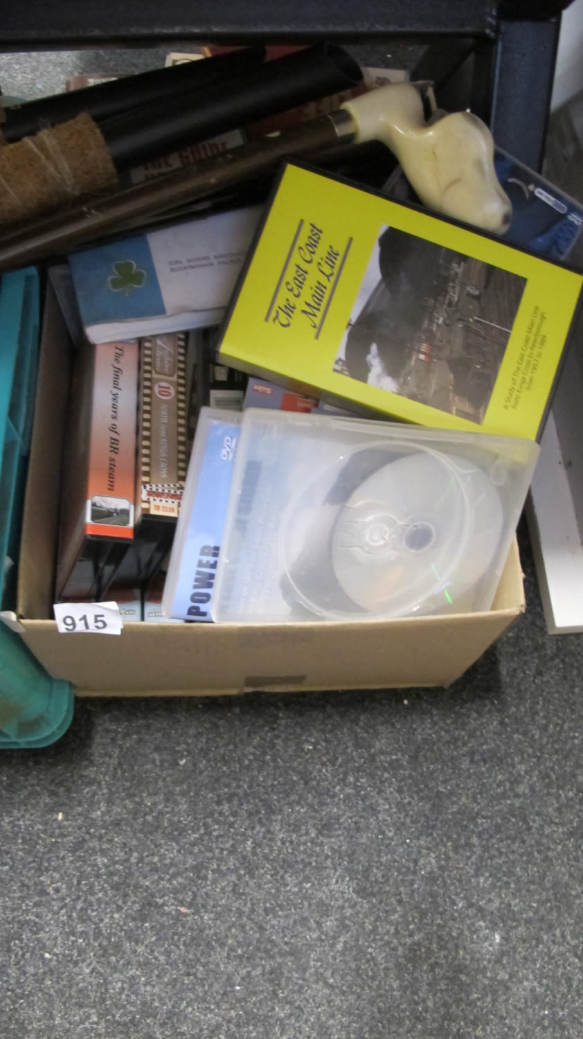 Lot 915: A tub of videos and DVD's on trains