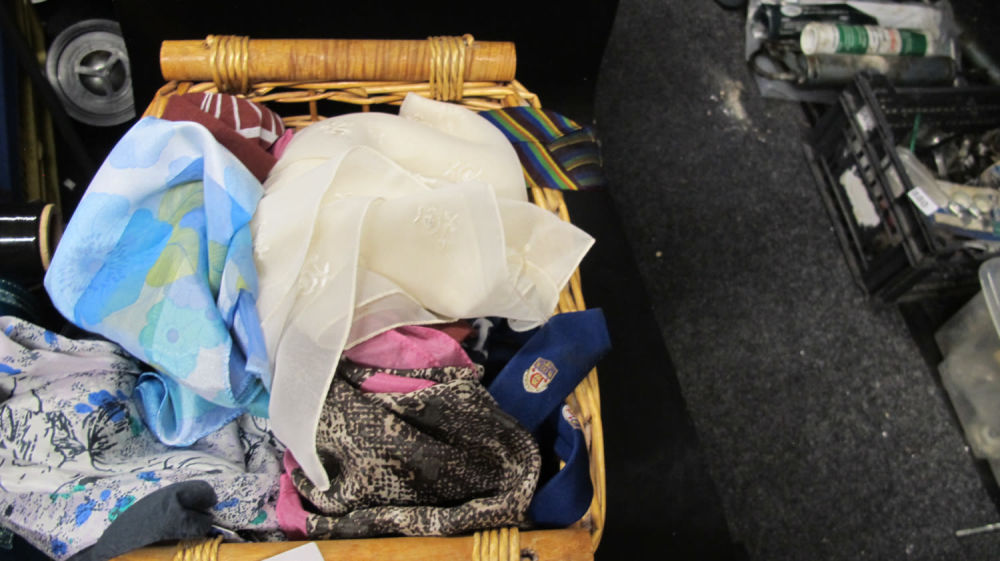 Lot 934: A basket of scarves and ties