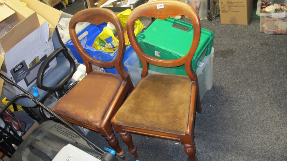 Lot 946: a pair of balloon backed antique dining chairs