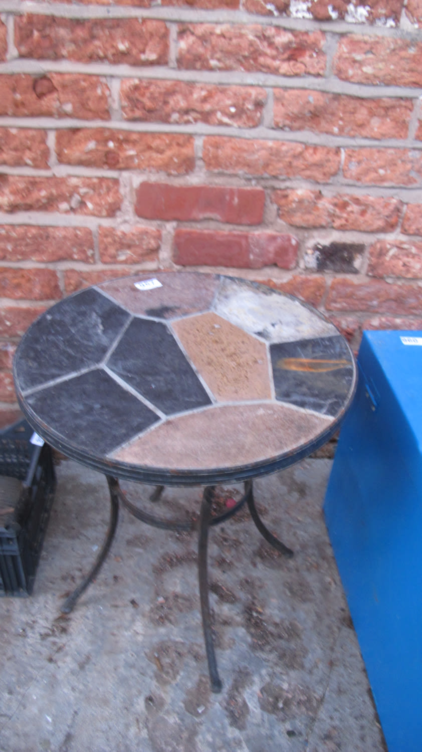 Lot 957: Tile topped garden table