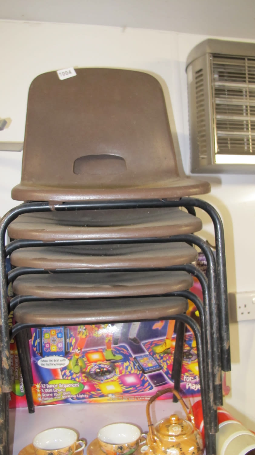Lot 1004: Stackable plastic chairs