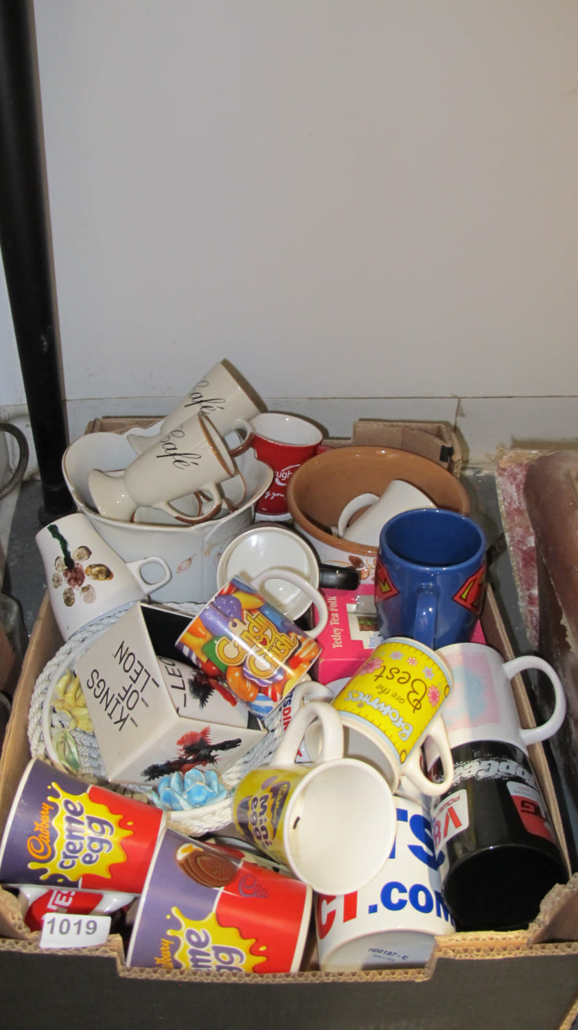 Lot 1019: A box of mugs etc.