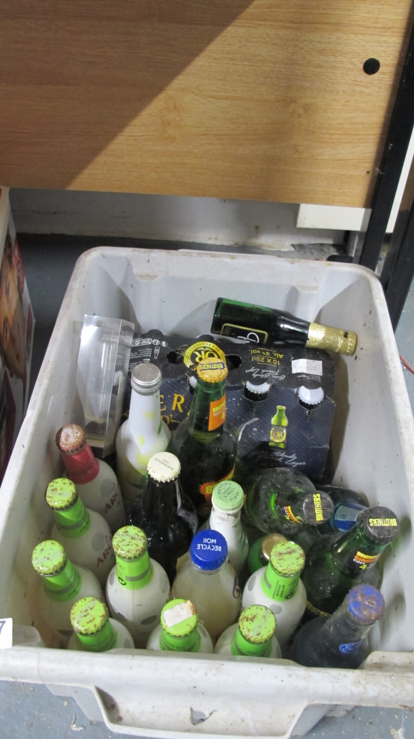 Lot 1027: A tub of alcohol