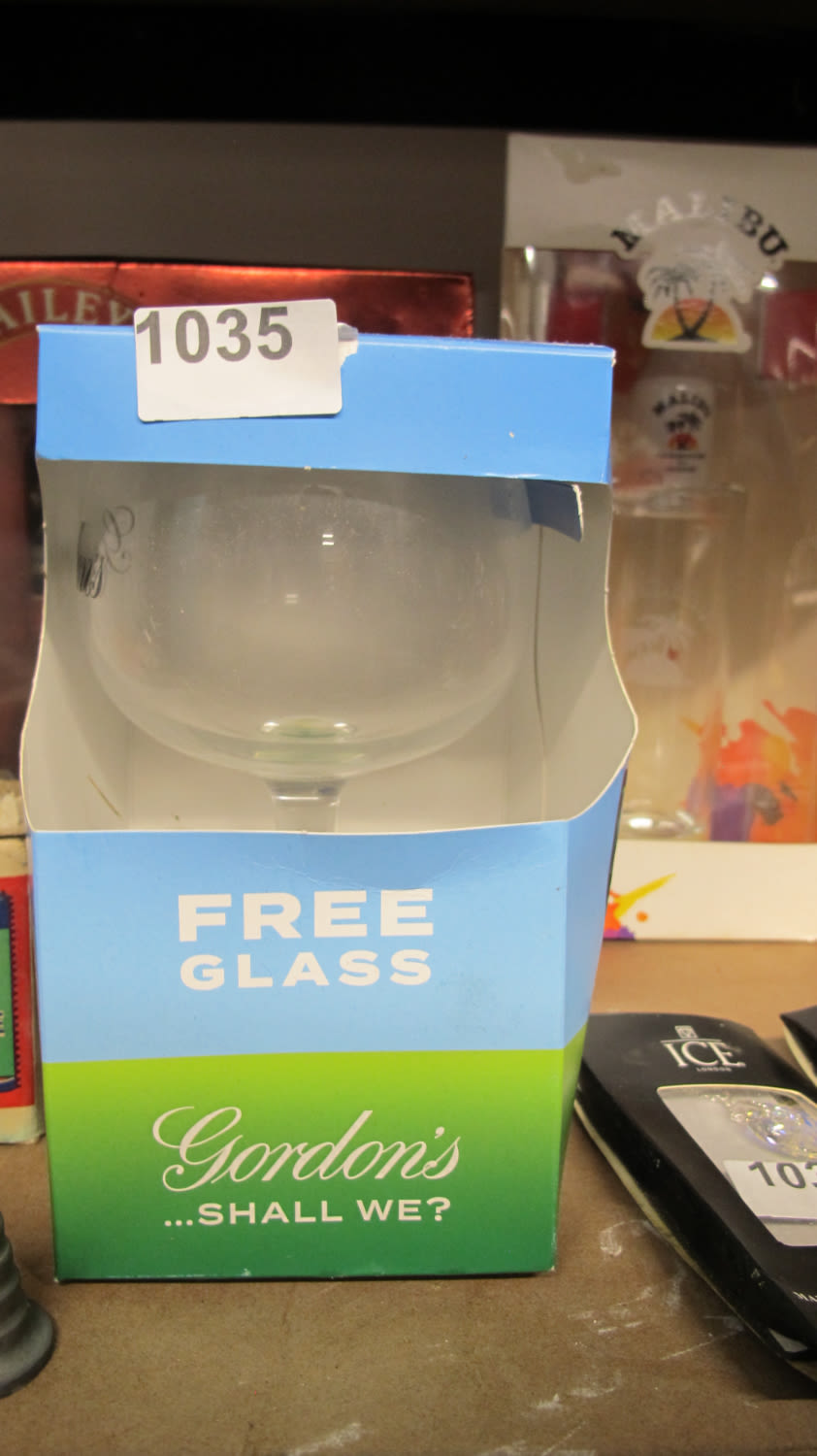 Lot 1035: Gordons gin glass