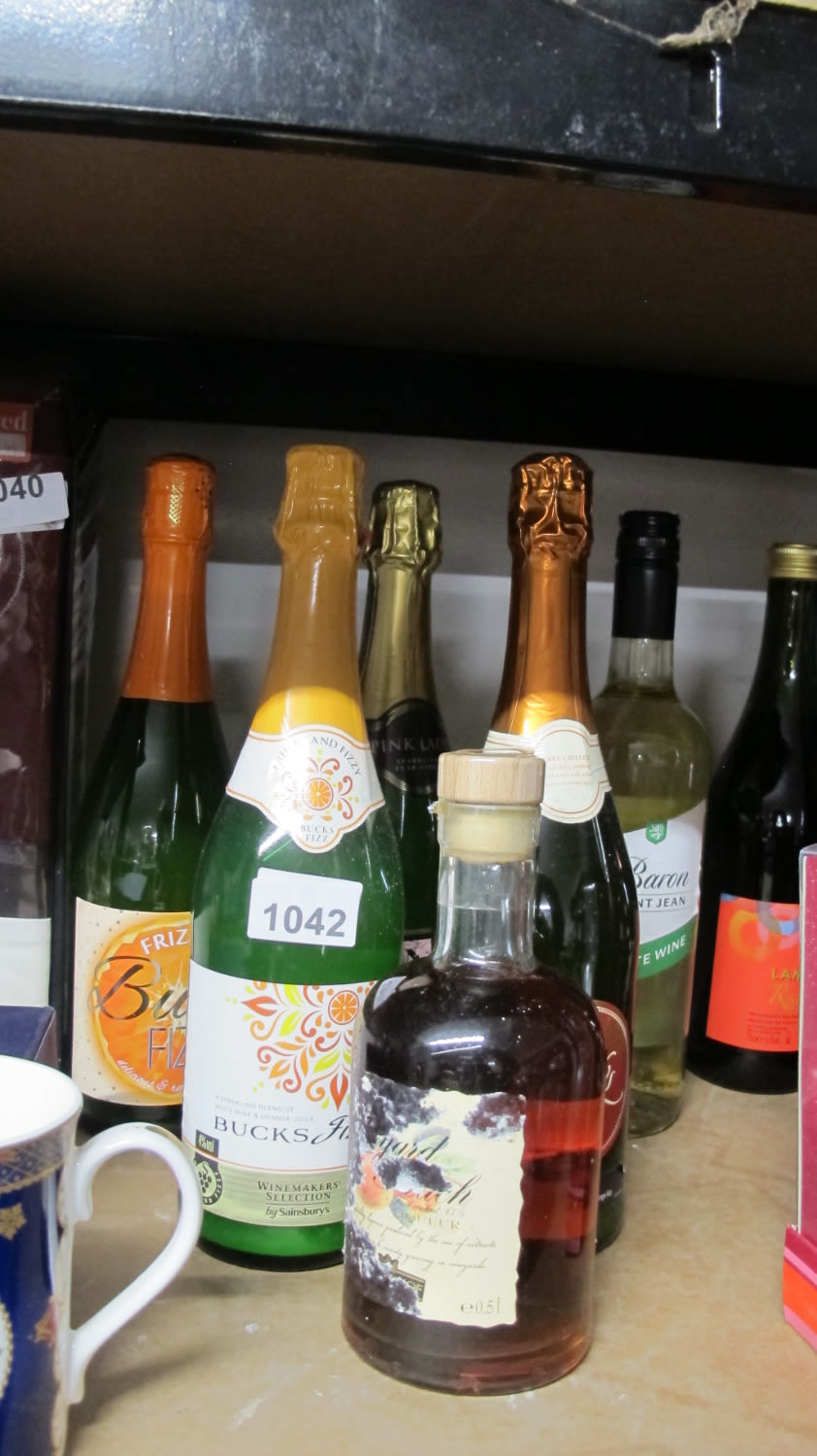 Lot 1042: A quantity of alcohol