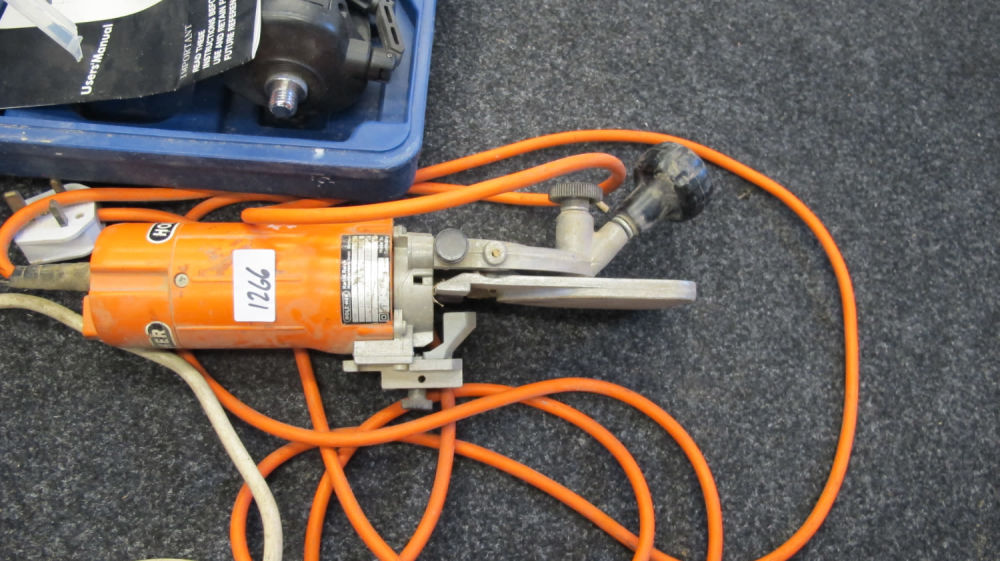 Lot 1266: Some fancy electric tool
