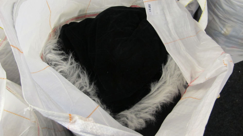 Lot 1282: a large bag of new clothing