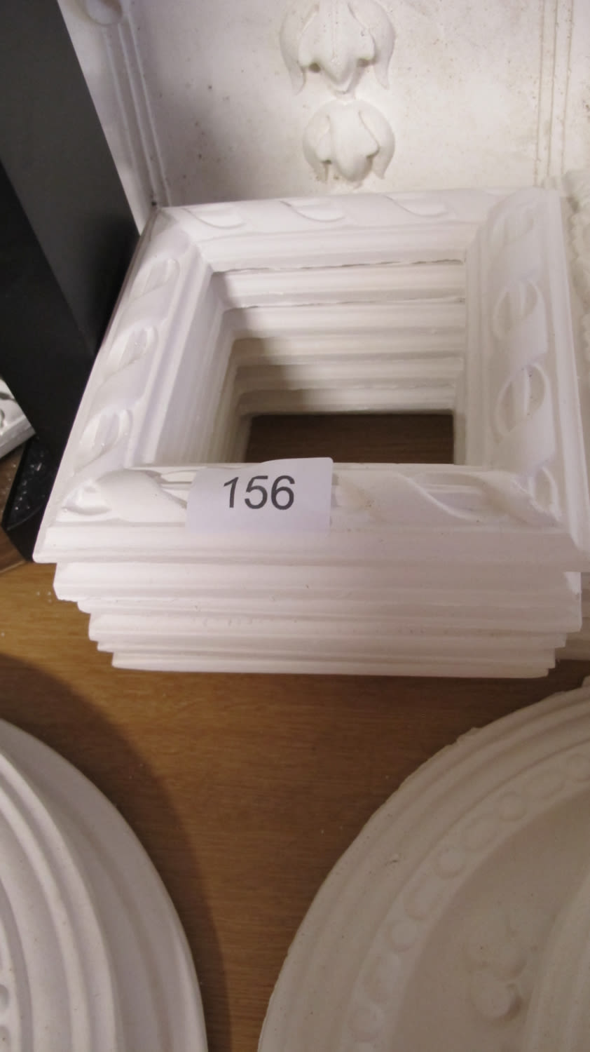 Lot 156: Decorative plaster light switch surround mouldings