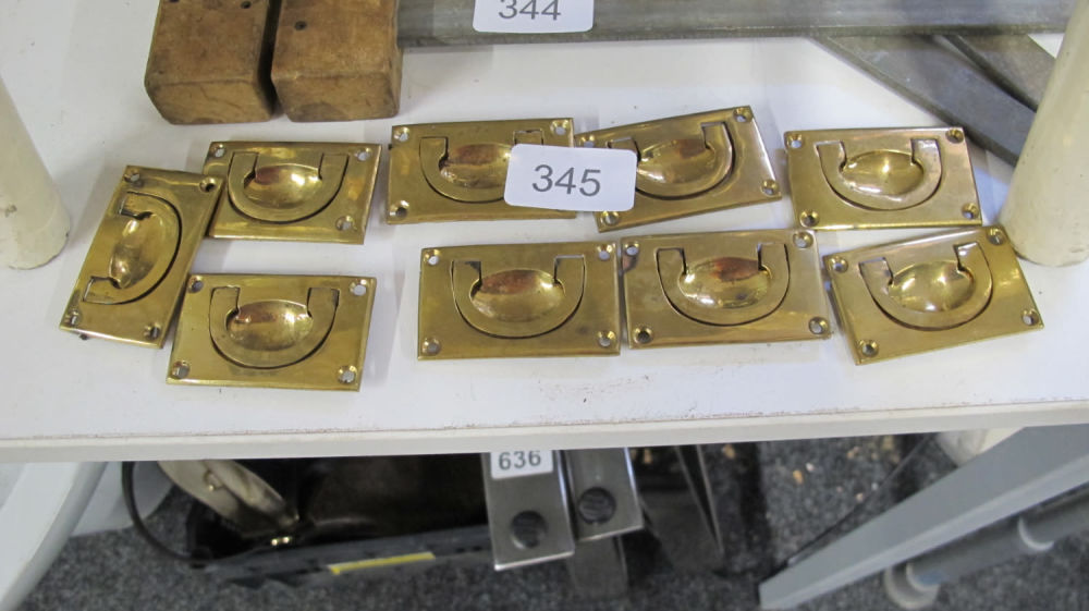 Lot 345: A quantity of antique brass handles