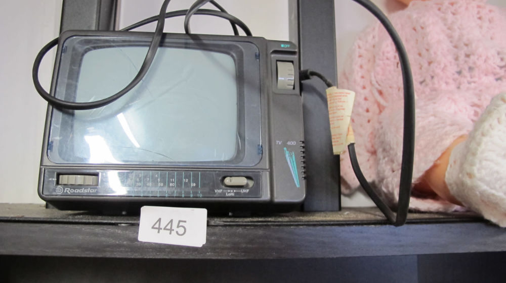 Lot 445: Roadstar mini crt tv/radio