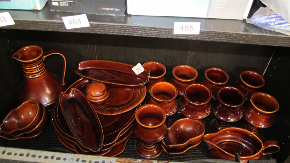Lot 473: A quantity of treacle glazed kitchenware