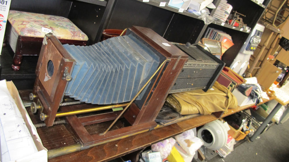 Lot 479: Large format antique mahogany wall mounting bellows photographic...
