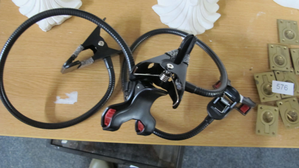 Lot 575: Headboard flexi clips for mobile phones