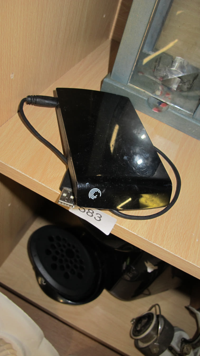Lot 583: seagate portable external HD storage for all your...