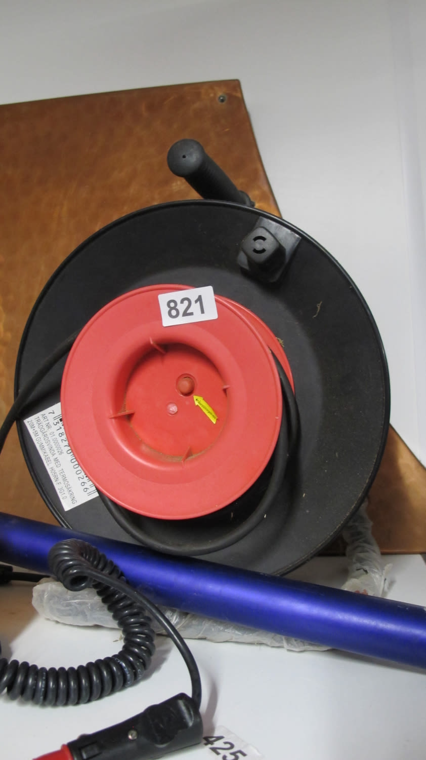 Lot 821: 30 foot Extension cable reel