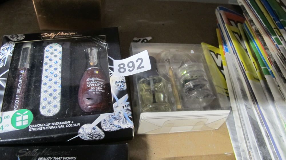 Lot 892: Nail varnish gift sets
