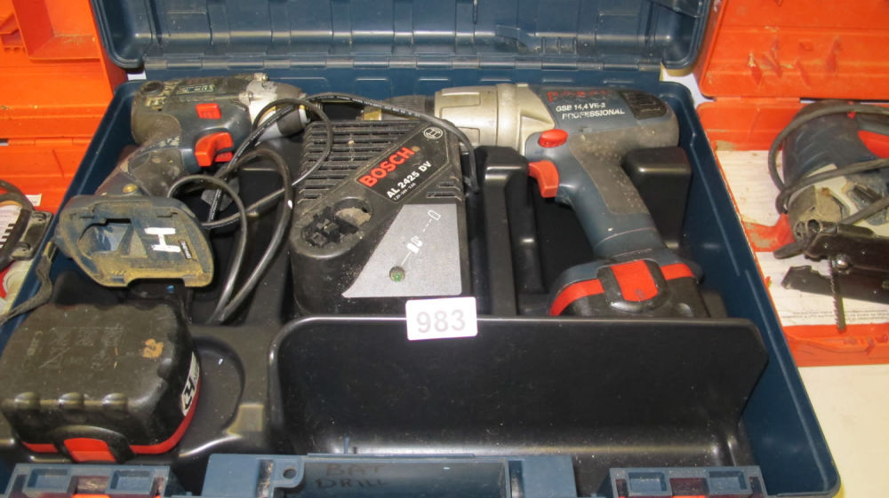 Lot 983: Bosch battery tool kit