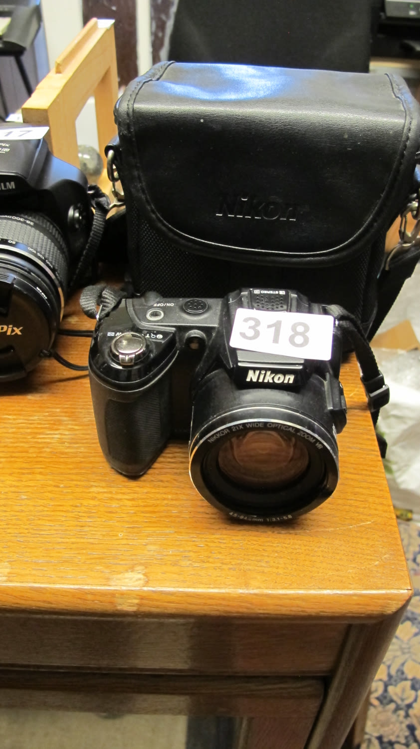 Lot 318: Nikon digital camera with branded case