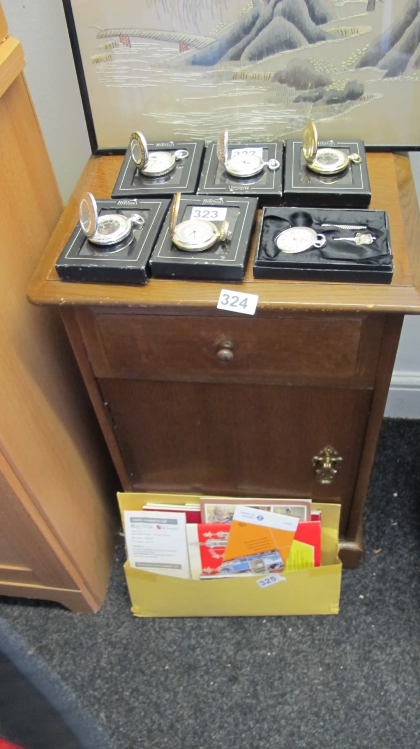 Lot 324: stag bedside Table