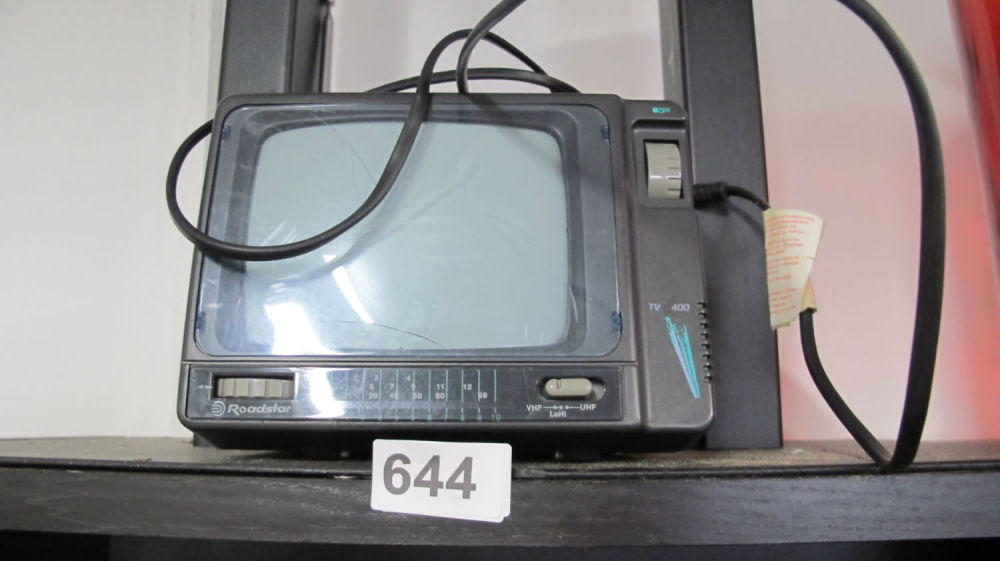 Lot 644: Portable crt TV