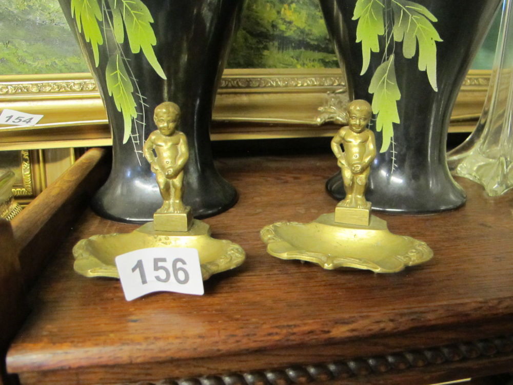 Lot 156: 2 Mannekin Pis brass ashtrays