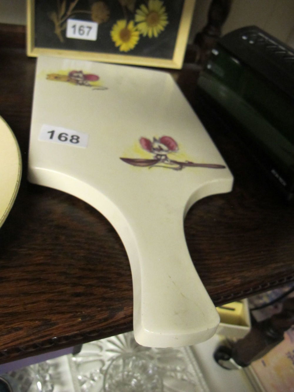 Lot 168: Ceramic cheese paddle