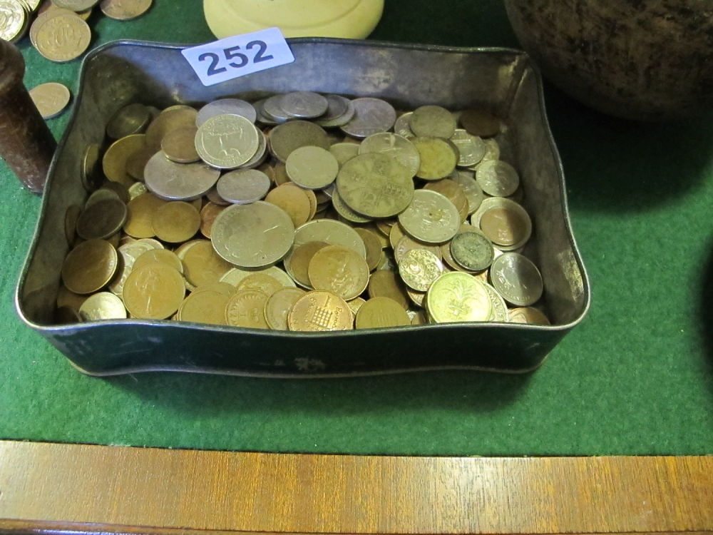 Lot 252: A tin of coins including silver dollars etc