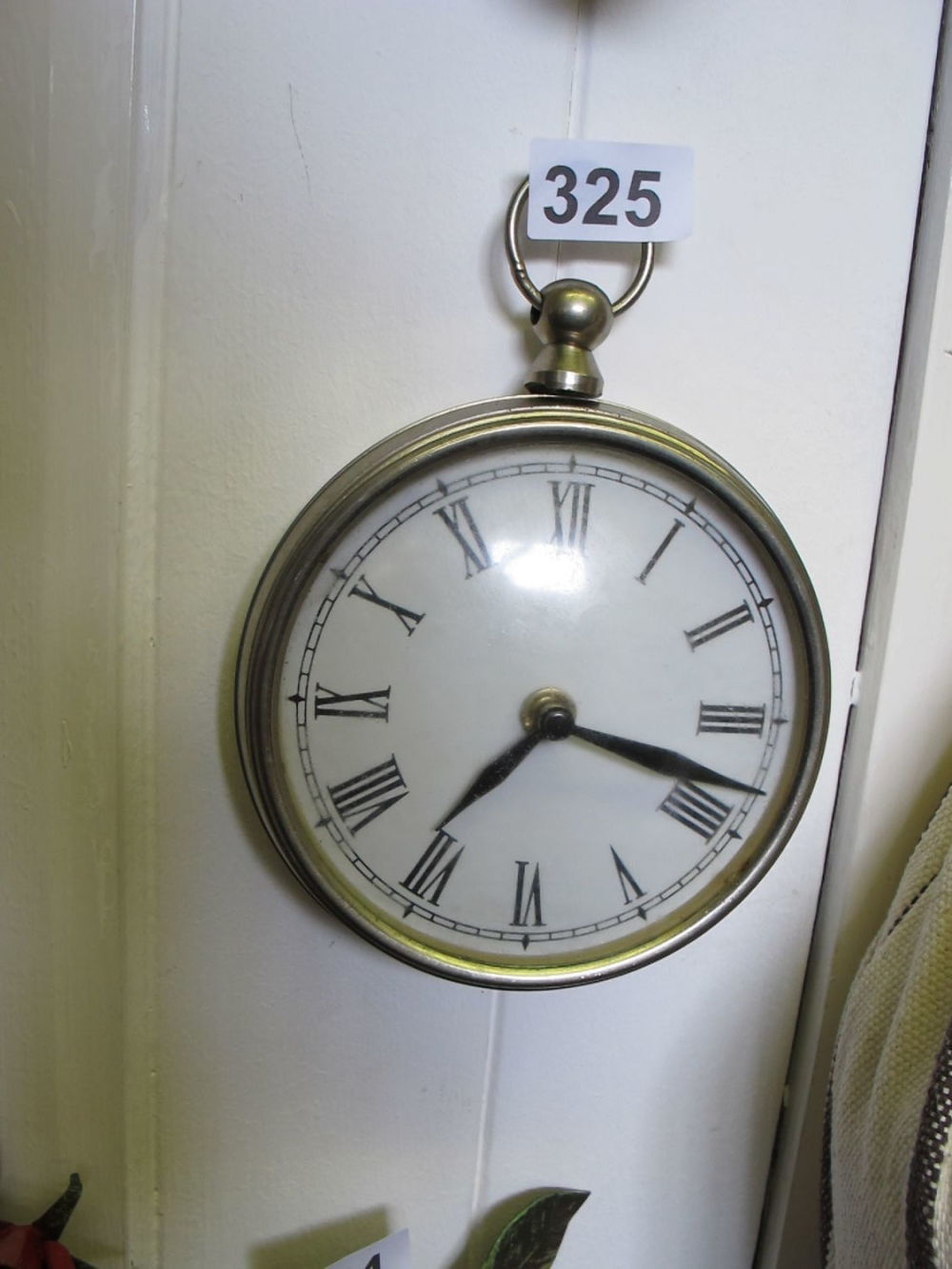 Lot 325: Pocket watch styled wall clock