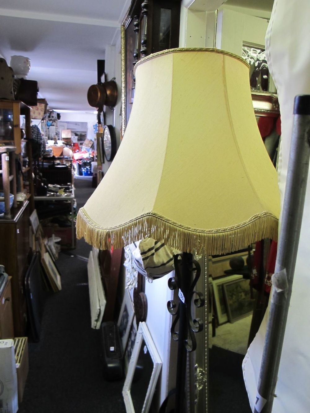 Lot 336: Ornate metal Standard lamp