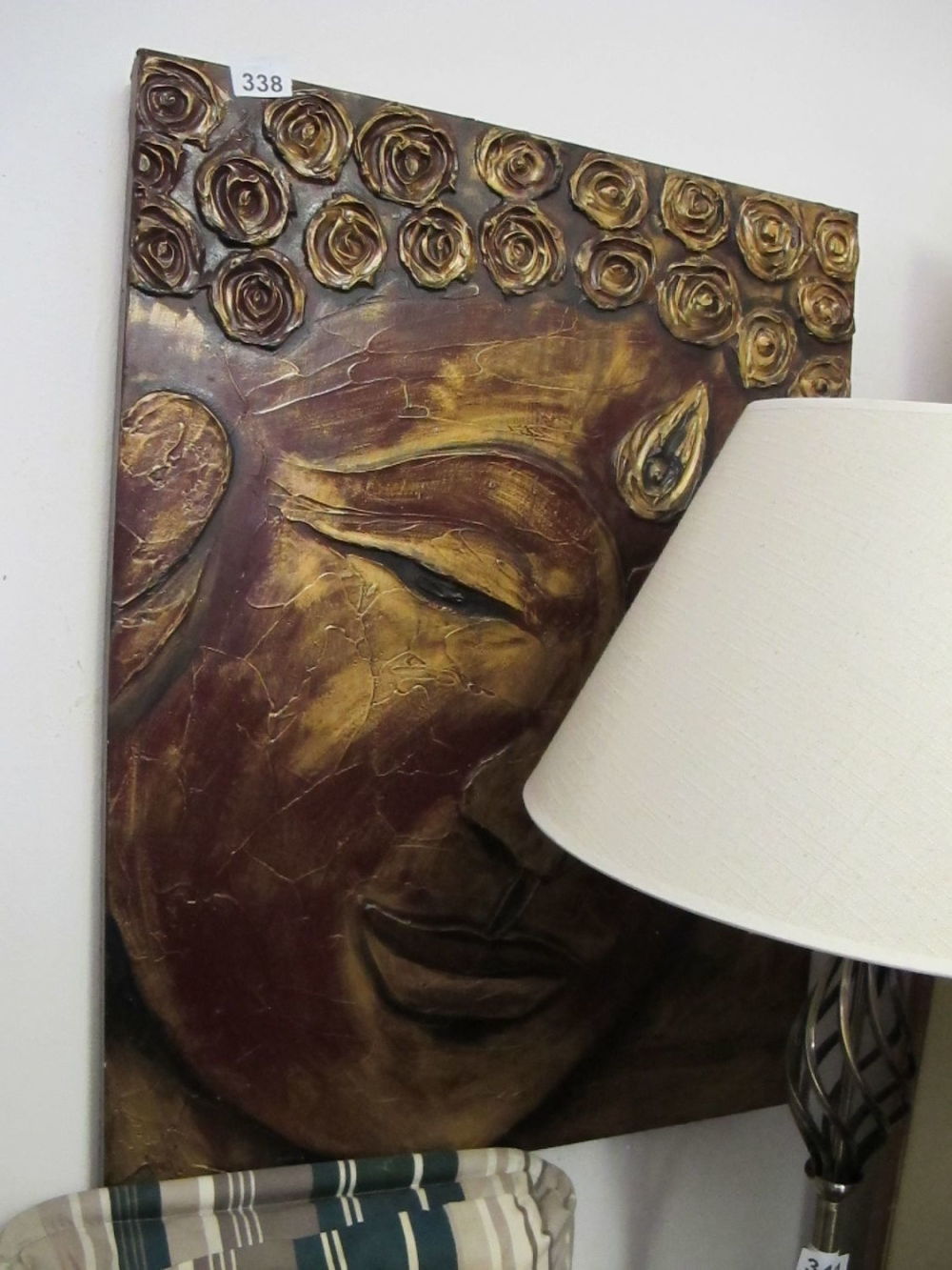 Lot 338: Buddha wall art