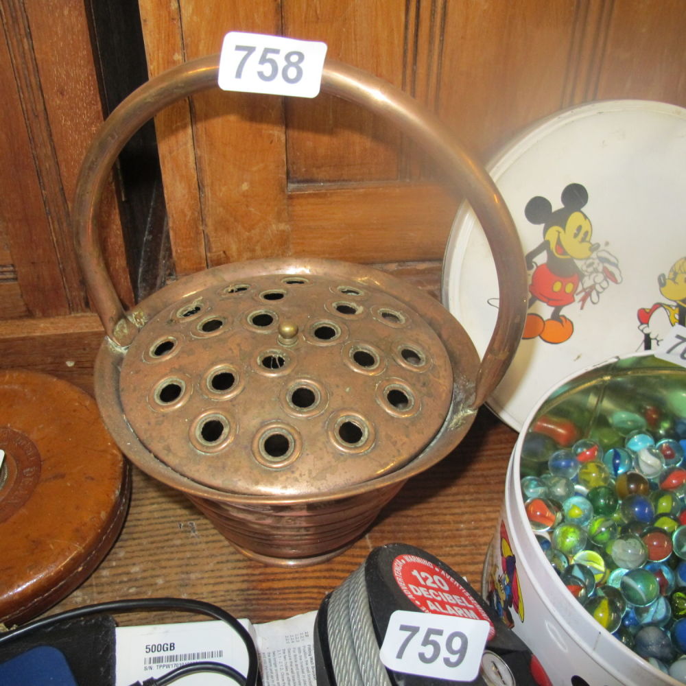 Lot 758: copper flower pot with frog