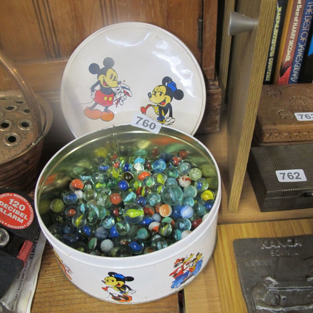 Lot 760: Vintage Disney tin of marbles