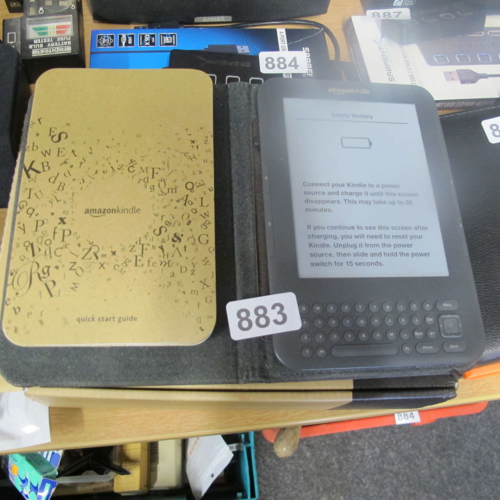 Lot 883: Kindle