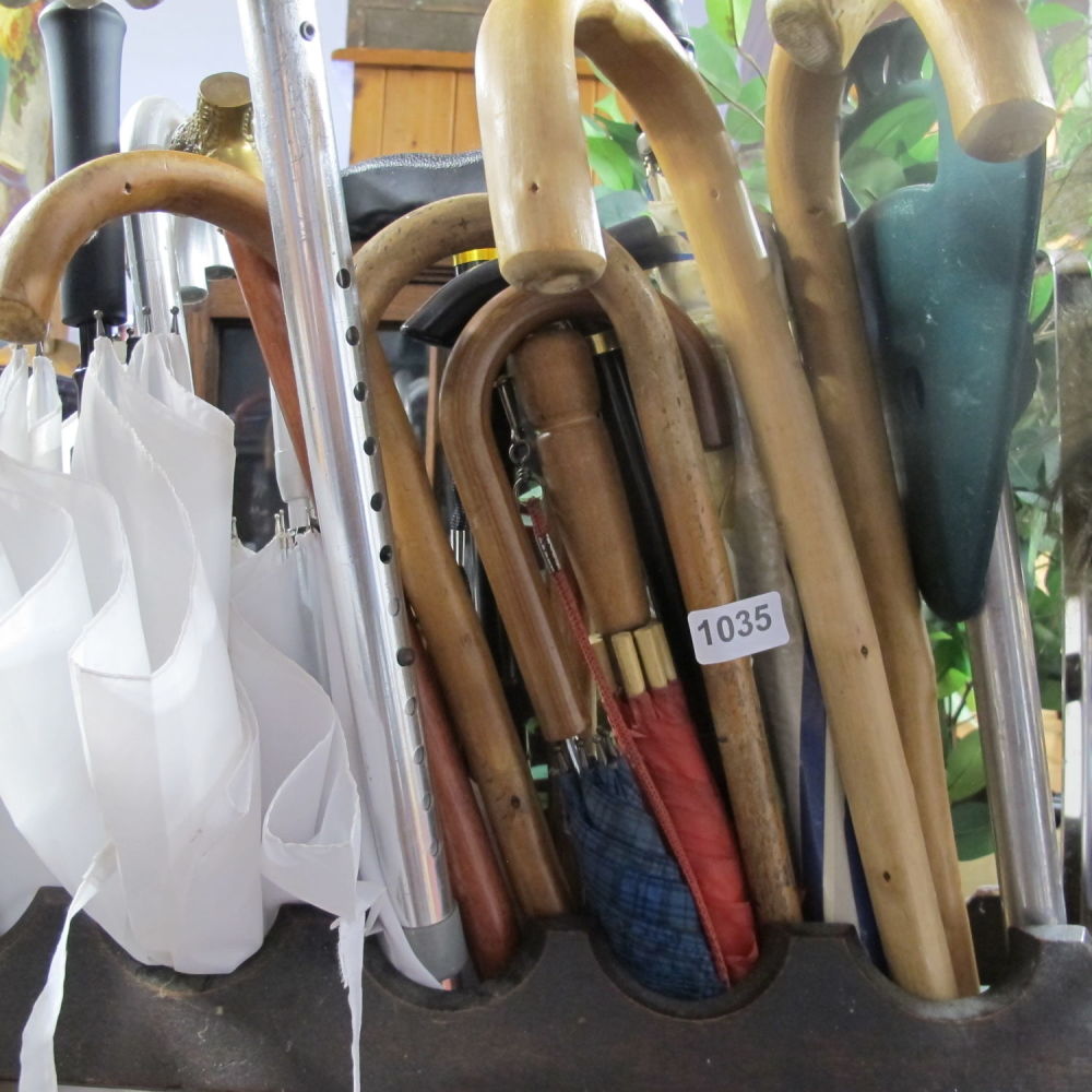 Lot 1035: Quantity of sticks and umbrellas