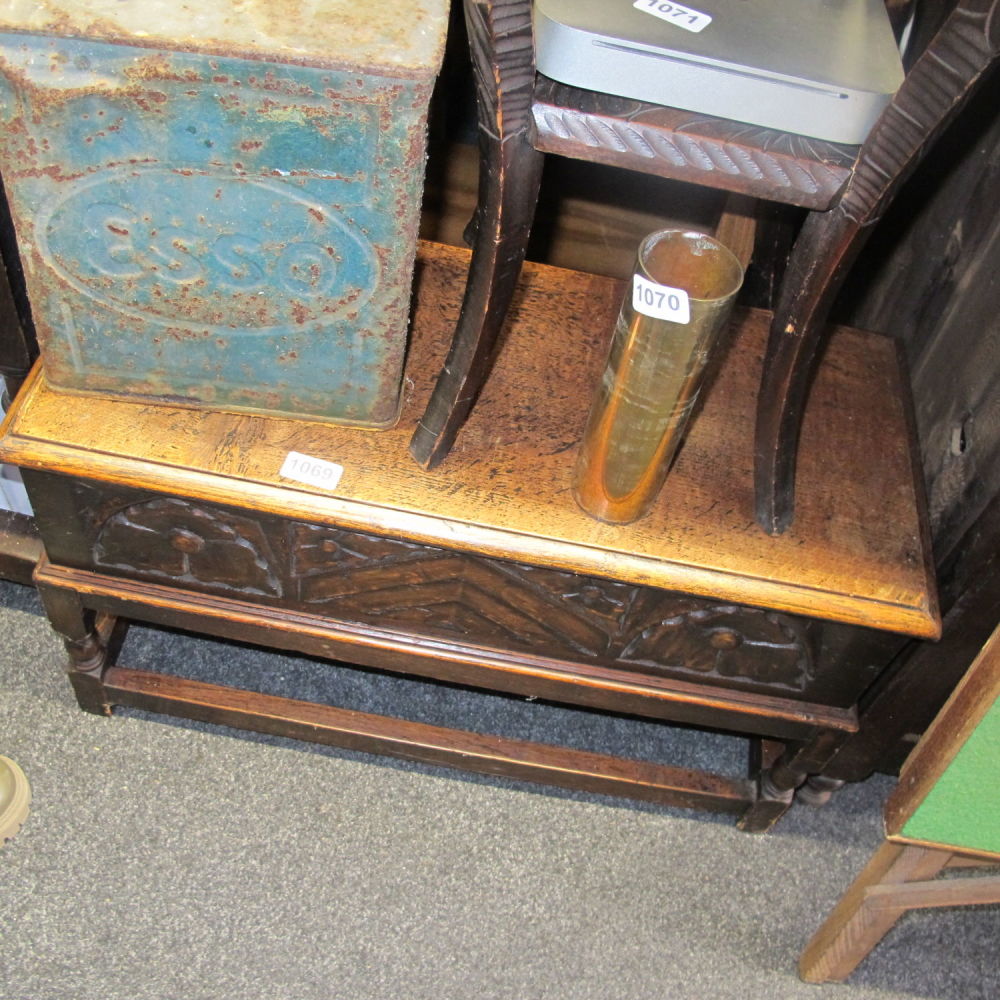Lot 1069: 19th century carved bread cupboard