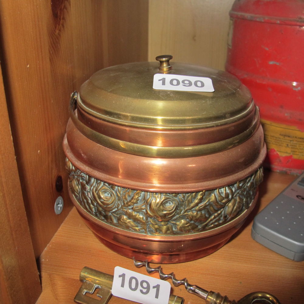Lot 1090: Brass and copper ice bucket