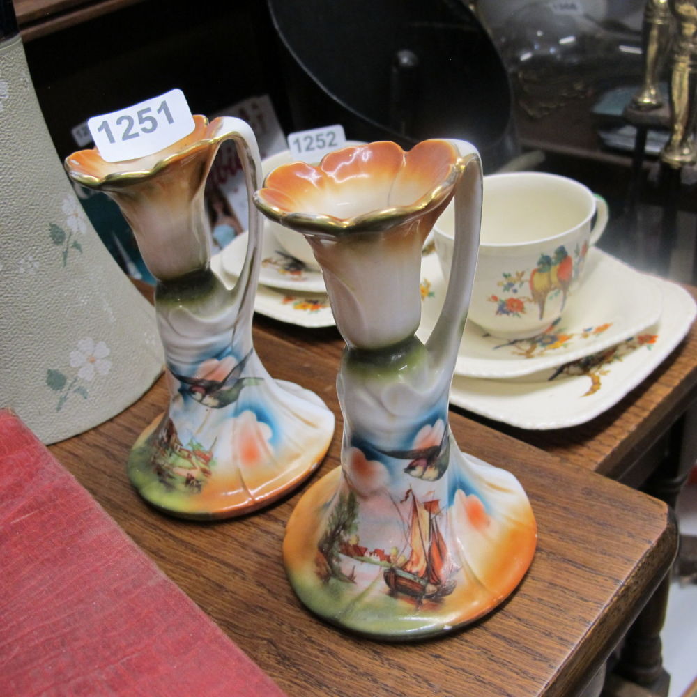 Lot 1251: 2 ceramic candlesticks