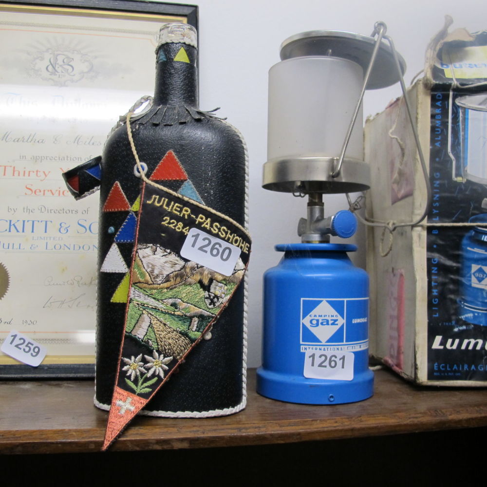Lot 1260: Leather covered bottle