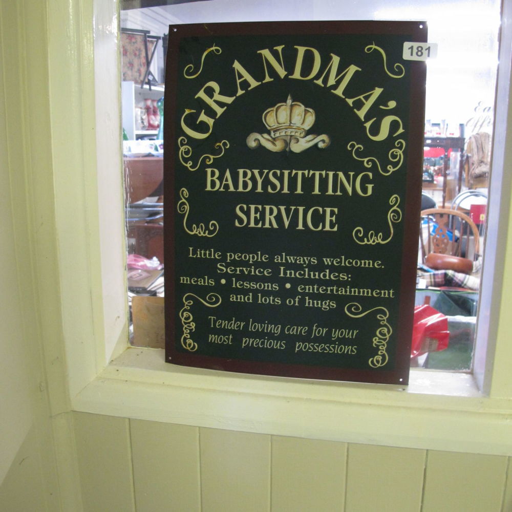 Lot 181: Metal wall plaque