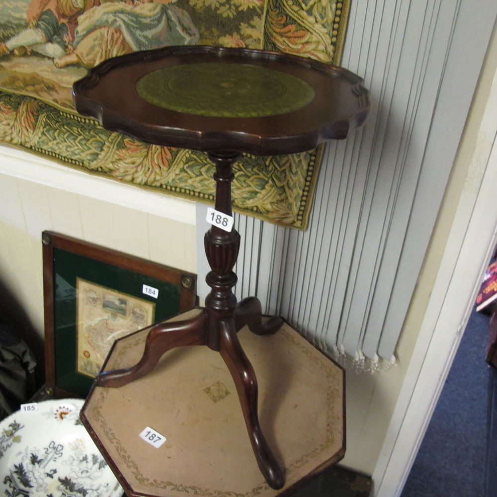 Lot 188: Leather topped wine table