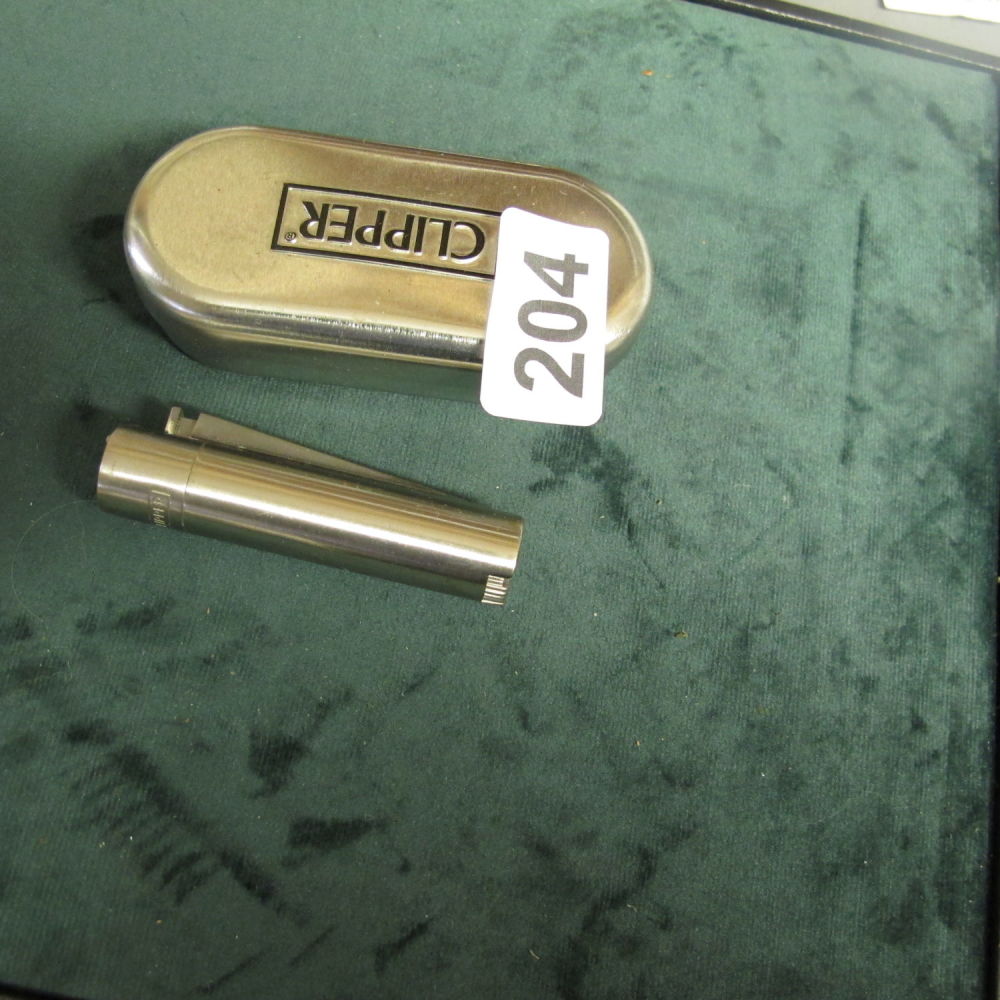 Lot 204: Classic metal clipper lighter & accessory pack