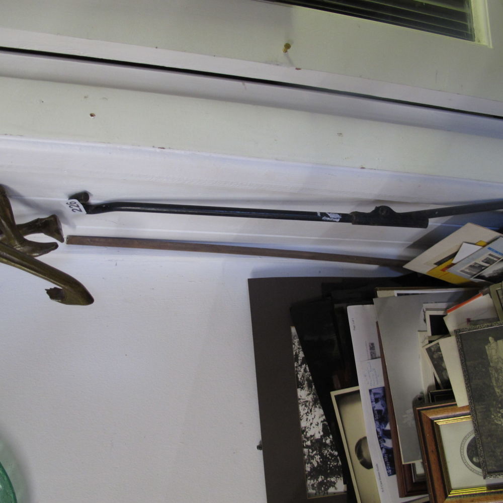 Lot 226: A metal fold out hook