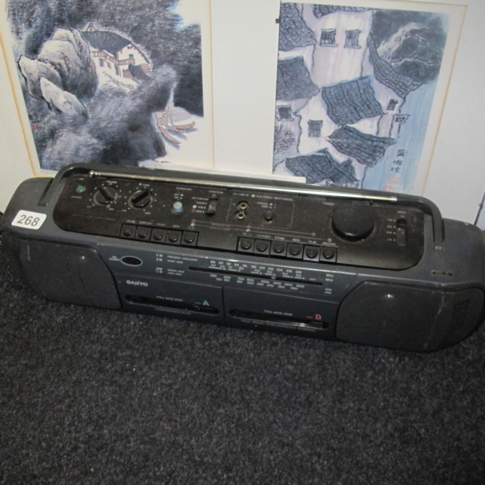 Lot 268: A Sanyo tape deck and radio