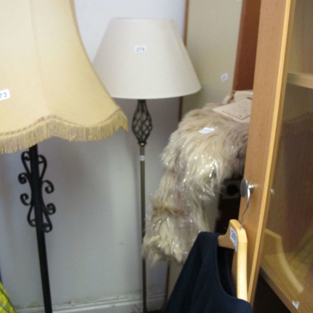 Lot 274: A wrought iron floor standing lamp
