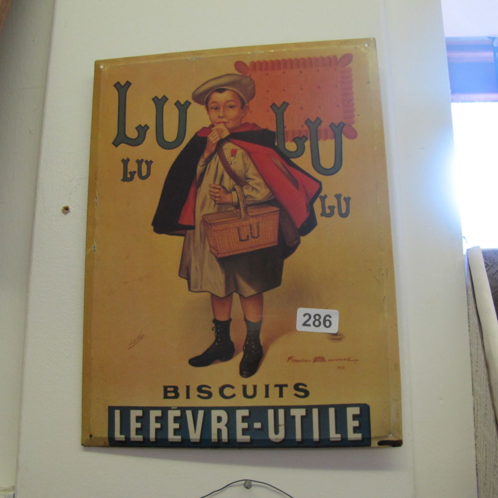 Lot 286: tin wall hanging sign advertising lu lu biscuits