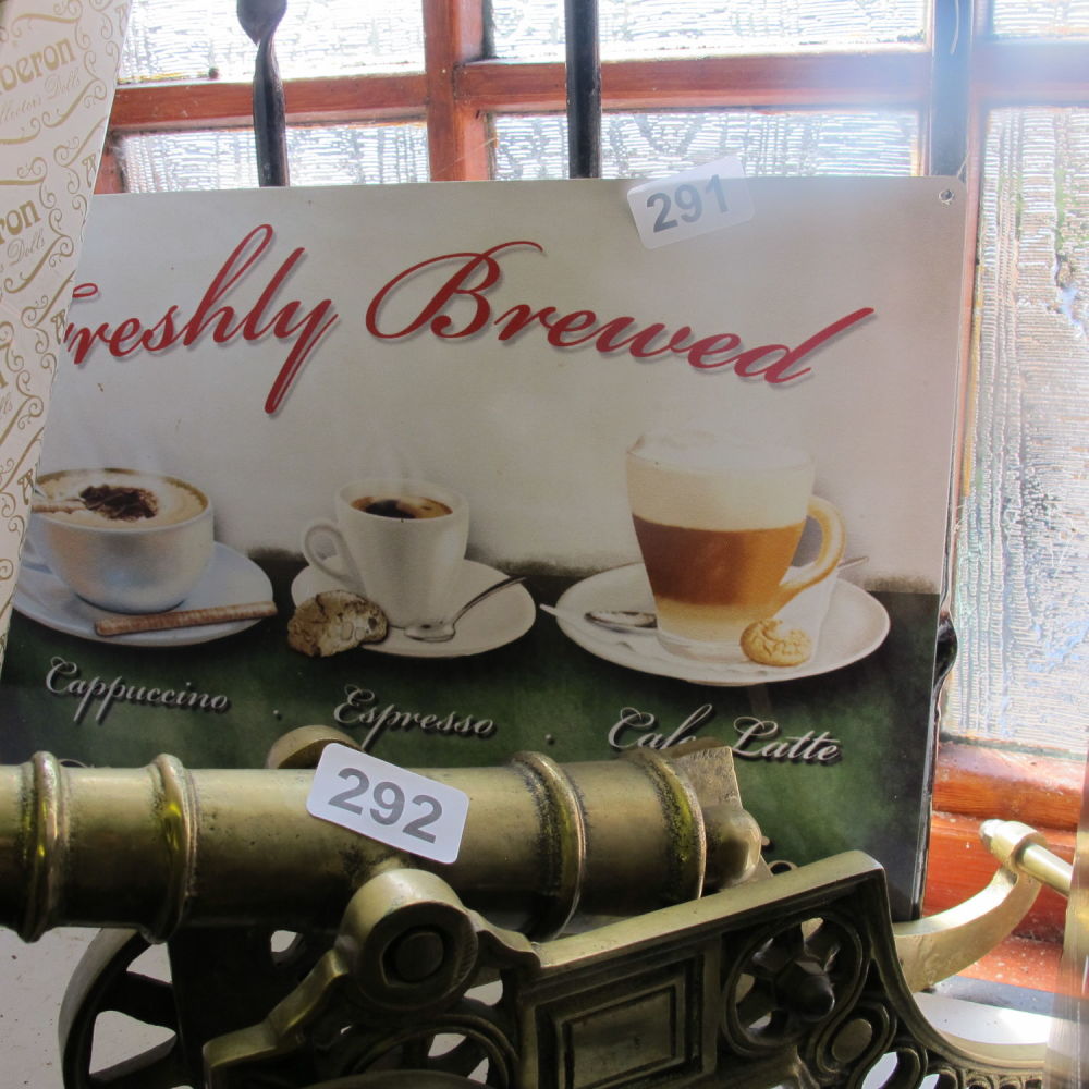 Lot 291: A metal wall sign depicting coffee