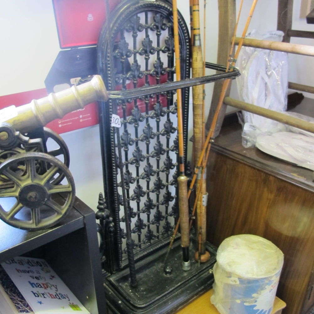 Lot 303: An ornate cast iron umbrella walking stick hallway...