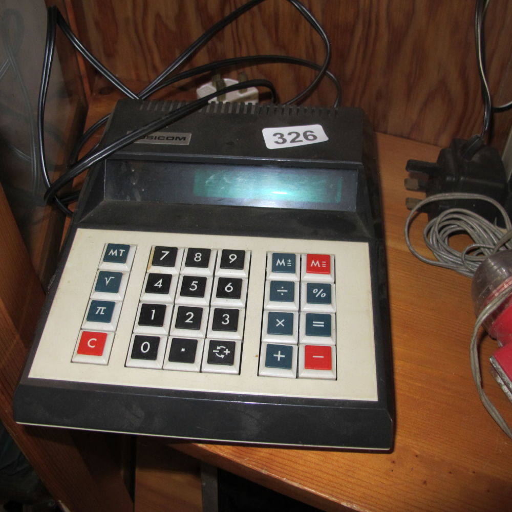 Lot 326: a large collectible busicom /rockwell calculator