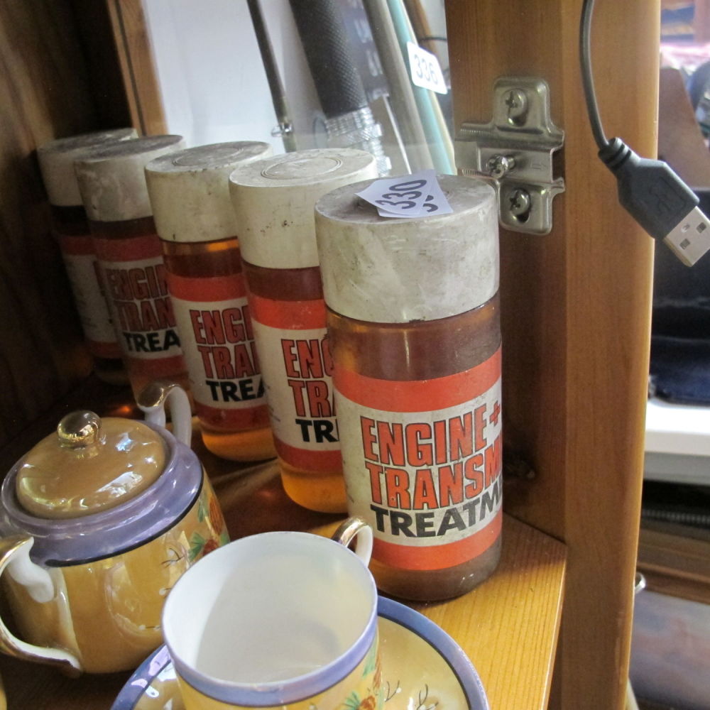 Lot 330: Five bottles of engine transmission additive